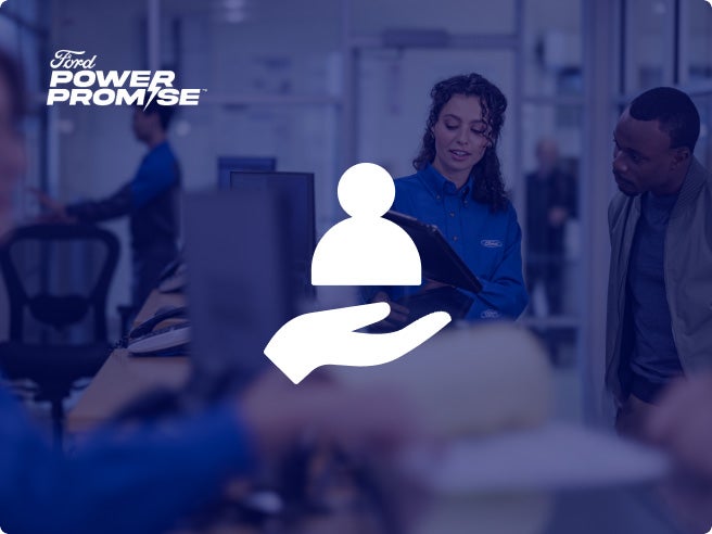 An F-150 Lightning being driven in the city